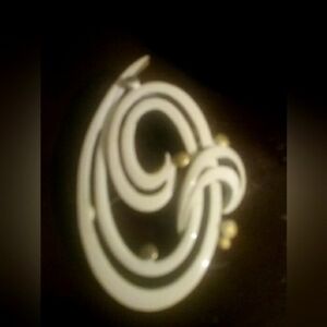Vintage MONET White Enamel Curved Pin